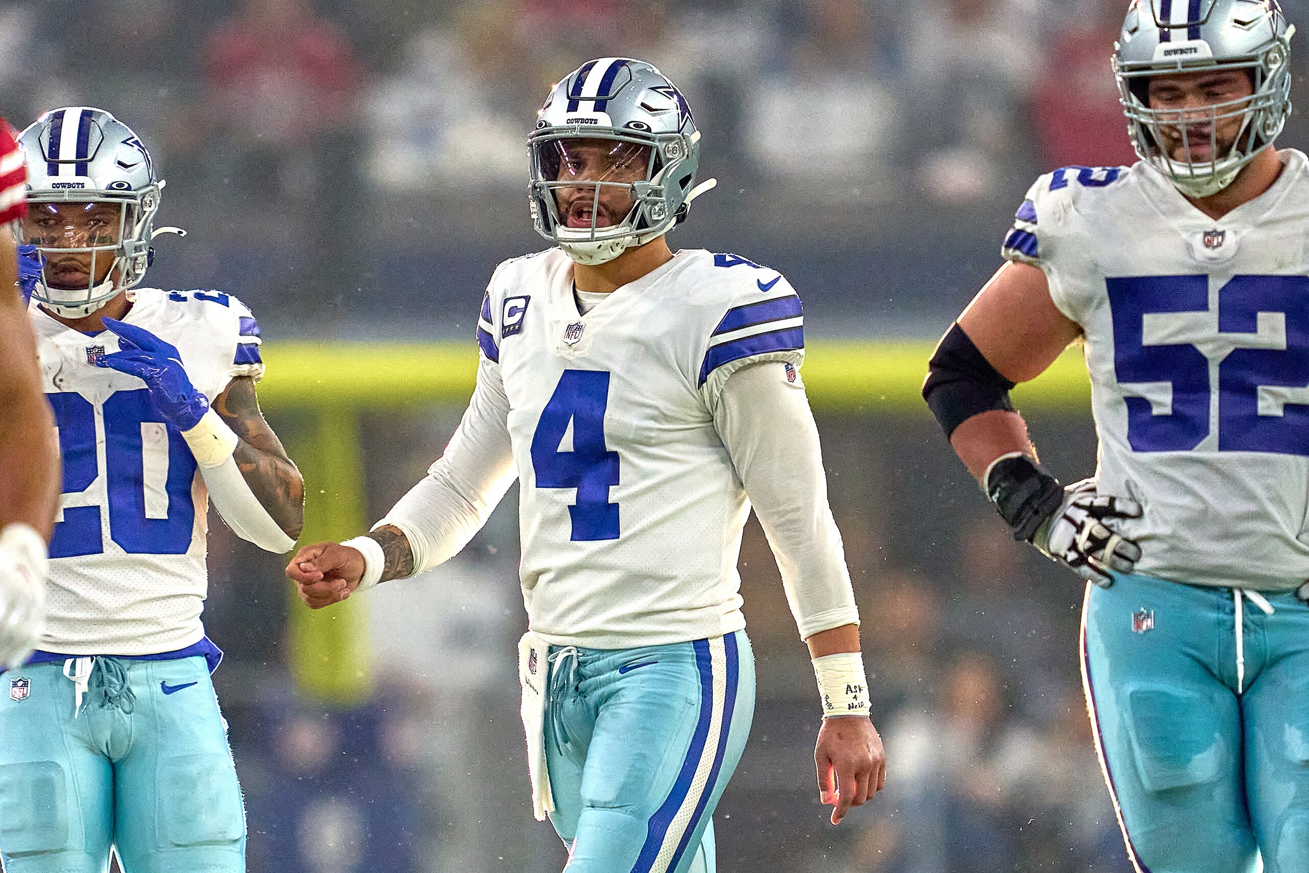 ARLINGTON, TX - JANUARY 16: Dallas Cowboys quarterback Dak Prescott (4) looks on during the NFC Wild Card game between the San Francisco 49ers and the Dallas Cowboys on January 16, 2022 at AT&T Stadium in Arlington, TX. (Photo by Robin Alam/Icon Sportswir