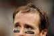 NEW ORLEANS, LA - DECEMBER 26: Quarterback Drew Brees #9 of the New Orleans Saints looks on against the Atlanta Falcons in the second quarter at the Mercedes-Benz Superdome on December 26, 2011 in New Orleans, Louisiana. (Photo by Chris Graythen/Getty Images)