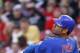 CINCINNATI, OH - SEPTEMBER 15: Carlos Pena #22 of the Chicago Cubs follows through on a two-run homer in the first inning during the game against the Cincinnati Reds at Great American Ball Park on September 15, 2011 in Cincinnati, Ohio. (Photo by Joe Robbins/Getty Images)