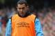 MANCHESTER, ENGLAND - SEPTEMBER 24: Carlos Tevez of Manchester City looks on from the sidelines during the Barclays Premier League match between Manchester City and Everton at the Etihad Stadium on September 24, 2011 in Manchester, England. (Photo by Michael Regan/Getty Images)