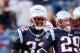 FOXBORO, MA - JANUARY 01: Sterling Moore #29 of the New England Patriots is congratulated by teammates Patrick Chung #25 and Devin McCourty #32 after Moore intercepted a pass against the Buffalo Bills on January 1, 2012 at Gillette Stadium in Foxboro, Massachusetts. (Photo by Elsa/Getty Images)