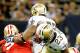 NEW ORLEANS, LA - AUGUST 12: Pierre Thomas #23 of the New Orleans Saints runs against San Francisco 49er defedners during a preseason game at Louisiana Superdome on August 12, 2011 in New Orleans, Louisiana. (Photo by Sean Gardner/Getty Images)