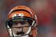 HOUSTON, TX - JANUARY 07: Andy Dalton #14 of the Cincinnati Bengals reacts against the Houston Texans during their 2012 AFC Wild Card Playoff game at Reliant Stadium on January 7, 2012 in Houston, Texas. (Photo by Jamie Squire/Getty Images)