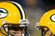 GREEN BAY, WI - DECEMBER 25: Jordy Nelson #87 and quarterback Aaron Rodgers #12 of the Green Bay Packers celebrate a touchdown in the fourth quarter against the Chicago Bears at Lambeau Field on December 25, 2011 in Green Bay, Wisconsin. (Photo by Matthew Stockman/Getty Images)