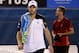 MELBOURNE, AUSTRALIA - JANUARY 19: Andy Roddick (L) of the USA walks from the court after retiring in his second round match against Lleyton Hewitt of Australia during day four of the 2012 Australian Open at Melbourne Park on January 19, 2012 in Melbourne, Australia. (Photo by Quinn Rooney/Getty Images)