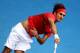 MELBOURNE, AUSTRALIA - JANUARY 20: Roger Federer of Switzerland serves in his third round match against Ivo Karlovic of Croatia during day five of the 2012 Australian Open at Melbourne Park on January 20, 2012 in Melbourne, Australia. (Photo by Clive Brunskill/Getty Images)