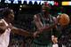 BOSTON, MA - JANUARY 16: Kevin Garnett #5 of the Boston Celtics looks to pass around Kendrick Perkins #5 of the Oklahoma City Thunder on January 16, 2012 at TD Garden in Boston, Massachusetts. NOTE TO USER: User expressly acknowledges and agrees that, by downloading and or using this photograph, User is consenting to the terms and conditions of the Getty Images License Agreement. (Photo by Elsa/Getty Images)