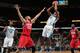 NEW ORLEANS, LA - JANUARY 04: Jarrett Jack #2 of the New Orleans Hornets makes a shot over Spencer Hawes #0 of the Philadelphia 76ers at New Orleans Arena on January 4, 2012 in New Orleans, Louisiana. NOTE TO USER: User expressly acknowledges and agrees that, by downloading and or using this photograph, User is consenting to the terms and conditions of the Getty Images License Agreement. (Photo by Chris Graythen/Getty Images)