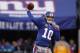 EAST RUTHERFORD, NJ - JANUARY 08: Eli Manning #10 of the New York Giants throws a pass against the Atlanta Falcons during their NFC Wild Card Playoff game at MetLife Stadium on January 8, 2012 in East Rutherford, New Jersey. (Photo by Nick Laham/Getty Images)