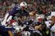 FOXBORO, MA - JANUARY 22: Tom Brady #12 of the New England Patriots dives into the end zone to score a touchdown in the fourth quarter against the Baltimore Ravens during their AFC Championship Game at Gillette Stadium on January 22, 2012 in Foxboro, Massachusetts. (Photo by Elsa/Getty Images)