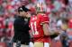 SAN FRANCISCO, CA - JANUARY 14: Head coach Jim Harbaugh of the San Francisco 49ers talks with quarterback Alex Smith #11 in the third quarter against the New Orleans Saints during the NFC Divisional playoff game at Candlestick Park on January 14, 2012 in San Francisco, California. (Photo by Thearon W. Henderson/Getty Images)