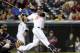 CLEVELAND, OH - SEPTEMBER 23: Carlos Santana #41 of the Cleveland Indians hits a solo, walk-off home run to defeat the Minnesota Twins 6-5 at Progressive Field on September 23, 2011 in Cleveland, Ohio. The Indians defeated the Twins 6-5. (Photo by Jason Miller/Getty Images)