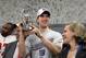 SAN FRANCISCO, CA - JANUARY 22: Eli Manning #10 of the New York Giants celebrates in the locker room with the George Halas Trophy NFC Championship trophy after the GIants won 20-17 in overtime against the San Francisco 49ers during the NFC Championship Game at Candlestick Park on January 22, 2012 in San Francisco, California. (Photo by Ezra Shaw/Getty Images)