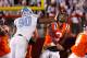 BLACKSBURG, VA - NOVEMBER 17: Logan Thomas #3 of the Virginia Tech Hokies is struck in the head after throwing the ball by Quinton Coples #90 of the North Carolina Tar Heels at Lane Stadium on November 17, 2011 in Blacksburg, Virginia. (Photo by Geoff Burke/Getty Images)
