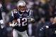 FOXBORO, MA - JANUARY 14: BenJarvus Green-Ellis #42 of the New England Patriots runs the ball against the Denver Broncos during their AFC Divisional Playoff Game at Gillette Stadium on January 14, 2012 in Foxboro, Massachusetts. (Photo by Elsa/Getty Images)