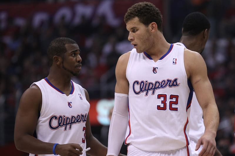 LOS ANGELES, CA - DECEMBER 30: Chris Paul #3 and Blake Griffin #32 of the Los Angeles Clippers confer during hte game with the Chicago Bulls at Staples Center on December 30, 2011 in Los Angeles, California. The Bulls won 114-101. NOTE TO USER: User expressly acknowledges and agrees that, by downloading and or using this photograph, User is consenting to the terms and conditions of the Getty Images License Agreement. (Photo by Stephen Dunn/Getty Images)