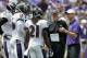 BALTIMORE, MD - AUGUST 06: Baltimore Ravens head coach John Harbaugh (R) and defensive coordinator Chuck Pagano (C) talk with the defense during training camp at M&T Bank Stadium on August 6, 2011 in Baltimore, Maryland. (Photo by Rob Carr/Getty Images)
