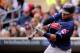 MINNEAPOLIS, MN - SEPTEMBER 17: Carlos Santana #41 of the Cleveland Indians hits a two run home run against the Minnesota Twins in the second inning on September 17, 2011 at Target Field in Minneapolis, Minnesota. (Photo by Hannah Foslien/Getty Images)