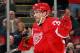 DETROIT, MI - OCTOBER 28: Pavel Datsyuk #13 of the Detroit Red Wings celebrates a second-period assist on a goal by teammate Tomas Holmstrom #96 while playing the San Jose Sharks at Joe Louis Arena on October 28, 2011 in Detroit, Michigan. San Jose won the game 4-2. (Photo by Gregory Shamus/Getty Images)