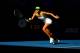 MELBOURNE, AUSTRALIA - JANUARY 26: Maria Sharapova of Russia plays a forehand in her semifinal match against Petra Kvitova of the Czech Republic during day eleven of the 2012 Australian Open at Melbourne Park on January 26, 2012 in Melbourne, Australia. (Photo by Clive Brunskill/Getty Images)