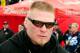 DAYTONA BEACH, FL - FEBRUARY 13: MMA fighter Brock Lesnar walks in the garage area during practice for the Daytona 500 at Daytona International Speedway on February 13, 2010 in Daytona Beach, Florida. (Photo by Sam Greenwood/Getty Images for NASCAR)