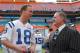 Peyton Manning of the Indianapolis Colts, left, talks with team owner Jim Irsay during Media Day prior to Super Bowl XLI at Dolphins Stadium in Miami, Florida on January 30, 2007. (Photo by A. Messerschmidt/Getty Images)