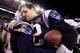 FOXBORO, MA - JANUARY 22: Tom Brady #12 of the New England Patriots celebrates after defeating the Baltimore Ravens in the AFC Championship Game at Gillette Stadium on January 22, 2012 in Foxboro, Massachusetts. The New England Patriots defeated the Baltimore Ravens 20-23. (Photo by Elsa/Getty Images)