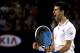 MELBOURNE, AUSTRALIA - JANUARY 27: Novak Djokovic of Serbia celebrates winning match point in his semifinal match against Andy Murray of Great Britain during day twelve of the 2012 Australian Open at Melbourne Park on January 27, 2012 in Melbourne, Australia. (Photo by Aaron Favila-Pool/Getty Images)