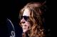 ASPEN, CO - JANUARY 25: Shaun White of Carlsbad, California takes the podium to receive the gold medal in the Men's Snowboard Superpipe Final at Winter X Games 13 on Buttermilk Mountain on January 25, 2009 in Aspen, Colorado. White became the first to earn back to back Men's Snowboard Superpipe gold medals. (Photo by Doug Pensinger/Getty Images)