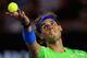 MELBOURNE, AUSTRALIA - JANUARY 29: Rafael Nadal of Spain serves in his men's final match against Novak Djokovic of Serbia during day fourteen of the 2012 Australian Open at Melbourne Park on January 29, 2012 in Melbourne, Australia. (Photo by Scott Barbour/Getty Images)