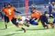 BJ Bello (8) shows off his nose for the ball as he strips this Crete Monee player last season