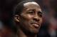 CHICAGO, IL - JANUARY 28: Dwight Howard #12 of the Orlando Magic reacts to the taunts of a fan as he sits on the bench during a game against the Chicago Bulls at the United Center on January 28, 2011 in Chicago, Illinois. NOTE TO USER: User expressly acknowledges and agrees that, by downloading and/or using this photograph, User is consenting to the terms and conditions of the Getty Images License Agreement. (Photo by Jonathan Daniel/Getty Images)
