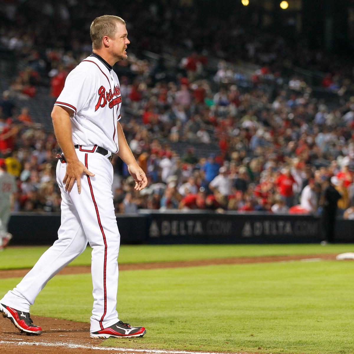 Retiring Atlanta Braves third baseman Chipper Jones salutes the