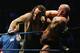 SYDNEY, AUSTRALIA - JUNE 15: The Undertaker (L) pushes Bam Neely into the corner during WWE Smackdown at Acer Arena on June 15, 2008 in Sydney, Australia. (Photo by Gaye Gerard/Getty Images)
