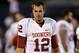 LAWRENCE, KS - OCTOBER 15: Quarterback Landry Jones #12 of the Oklahoma Sooners walks along the sidelines during the game against the Kansas Jayhawks on October 15, 2011 at Memorial Stadium in Lawrence, Kansas. (Photo by Jamie Squire/Getty Images)