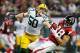 ATLANTA, GA - OCTOBER 09: Tony Gonzalez #88 of the Atlanta Falcons is tackled by A.J. Hawk #50 of the Green Bay Packers at Georgia Dome on October 9, 2011 in Atlanta, Georgia. (Photo by Kevin C. Cox/Getty Images)