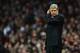 LONDON, ENGLAND - JANUARY 22: Arsene Wenger manager of Arsenal looks thoughtful during the Barclays Premier League match between Arsenal and Manchester United at Emirates Stadium on January 22, 2012 in London, England. (Photo by Mike Hewitt/Getty Images)