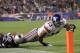 FOXBORO, MA - NOVEMBER 6: Ramses Barden #13 of the New York Giants is stopped by Phillip Adams #26 of the New England Patriots in the second half on November 6, 2011 in Foxboro, Massachusetts. The Giants won 24-20. (Photo by Jim Rogash/Getty Images)