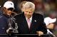 FOXBORO, MA - JANUARY 22: Robert Kraft, team owner of the New England Patriots celebrates with the Lamar Hunt Trophy after his team defeated the Baltimore Ravens in the AFC Championship Game at Gillette Stadium on January 22, 2012 in Foxboro, Massachusetts. The New England Patriots defeated the Baltimore Ravens 20-23. (Photo by Rob Carr/Getty Images)