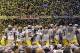 NEW ORLEANS, LA - JANUARY 03: The Michigan Wolverines celebrate as confetti falls after they won 23-20 against the Virginia Tech Hokies during the Allstate Sugar Bowl at Mercedes-Benz Superdome on January 3, 2012 in New Orleans, Louisiana. (Photo by Matthew Stockman/Getty Images)