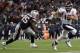 Tebow scrambling against the New England Patriots