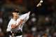 BALTIMORE, MD - SEPTEMBER 17: Starting pitcher Zach Britton #53 of the Baltimore Orioles works the first inning against the Los Angeles Angels of Anaheim at Oriole Park at Camden Yards on September 17, 2011 in Baltimore, Maryland. (Photo by Patrick Smith/Getty Images)