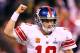 INDIANAPOLIS, IN - FEBRUARY 05: Eli Manning #10 of the New York Giants reacts in the first half while taking on the New England Patriots during Super Bowl XLVI at Lucas Oil Stadium on February 5, 2012 in Indianapolis, Indiana. Manning, named MVP, led the Giants to a 21-17 victory. (Photo by Al Bello/Getty Images)