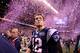INDIANAPOLIS, IN - FEBRUARY 05: Tom Brady #12 of the New England Patriots celebrates after losing to the New York Giants by a score of 21-17 in Super Bowl XLVI at Lucas Oil Stadium on February 5, 2012 in Indianapolis, Indiana. (Photo by Elsa/Getty Images)