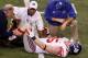 INDIANAPOLIS, IN - FEBRUARY 05: Jake Ballard #85 of the New York Giants is attended by the training staff during the game against the New England Patriots during Super Bowl XLVI at Lucas Oil Stadium on February 5, 2012 in Indianapolis, Indiana. (Photo by Gregory Shamus/Getty Images)