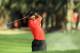 ABU DHABI, UNITED ARAB EMIRATES - JANUARY 29: Tiger Woods of the USA plays his second shot on the par 5, 10th hole during the final round of the Abu Dhabi HSBC Championship at the Abu Dhabi Golf Club on January 29, 2012 in Abu Dhabi, United Arab Emirates. (Photo by David Cannon/Getty Images)