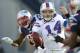FOXBORO, MA - JANUARY 1: Ryan Fitzpatrick #14 of the Buffalo Bills feels the pressure New England Patriots defense in the first half at Gillette Stadium on January 1, 2012 in Foxboro, Massachusetts. (Photo by Jim Rogash/Getty Images)