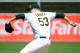 OAKLAND, CA - SEPTEMBER 22: Trevor Cahill #53 of the Oakland Athletics pitches against the Texas Rangers during an MLB basebll game at O.co Coliseum on September 22, 2011 in Oakland, California. (Photo by Thearon W. Henderson/Getty Images)