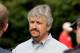BALTIMORE, MD - MAY 20: Steve Asmussen, the trainer of Preakness entrant Astrology, talks with the media outside the stakes barn at Pimlico Race Course on May 20, 2011 in Baltimore, Maryland. The 136th running of the Preakness Stakes will be run on May 21. (Photo by Rob Carr/Getty Images)