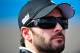AVONDALE, AZ - NOVEMBER 12: Jimmie Johnson, driver of the #48 Lowe's/Kobalt Tools Chevrolet, looks on during qualifying for the NASCAR Sprint Cup Series Kobalt Tools 500 at Phoenix International Raceway on November 12, 2011 in Avondale, Arizona. (Photo by Rainier Ehrhardt/Getty Images for NASCAR)